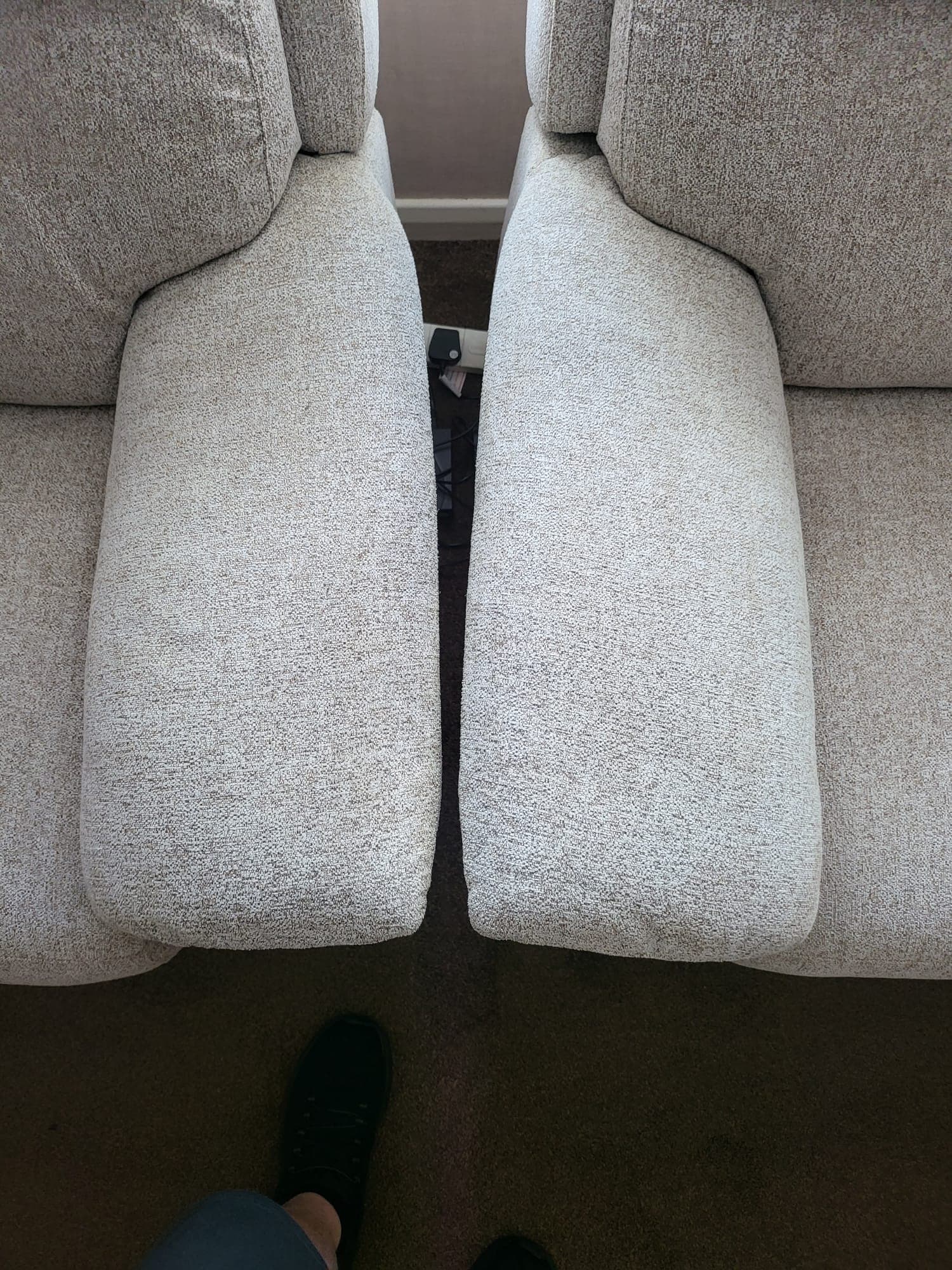 Light-fabric armchair seats after George completed professional upholstery cleaning